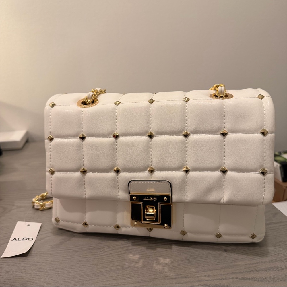 ALDO Olelirin white quilted crossbody bag w/ gold-tone hardware and stud details